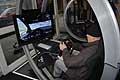 Gara con la PS3 che consentiva di scendere in pista al Motor Sport Arena con Vitantonio Liuzzi al Salone di Bologna 2013