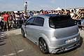 Car wash con lo spiker che assisteva all’evento dal tetto della sua auto dove era montato un palo Lap Dance al Donne e Motori Show 2015