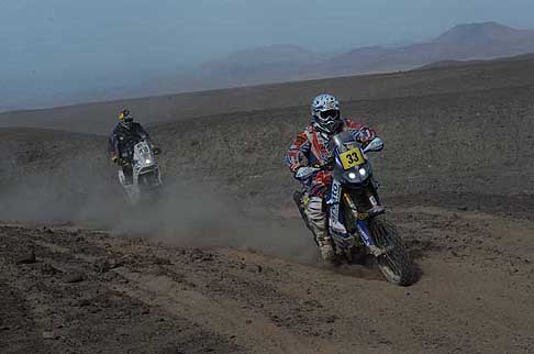 Moto KTM - Dakar stage 8 - n.110 moto KTM 450 Replica del Biker Christopher birch e con il n.33 la Yamaha 450 YZF Rally di Thierry Bethys width=