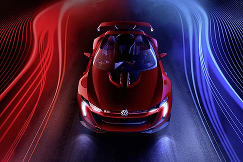 Volkswagen - Lunga 4.158 mm, larga 1.894 mm alta 1.090 mm, con un passo pari a 2.494 mm, la Volkswagen GTI Roadster adotta un enorme alettone posteriore, portiere con apertura ad elitra, abitacolo realizzato con una monoscocca in fibra di carbonio. width=