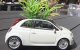 La Fiat 500C si trasforma in vaso per decorare Via Montenapoleone
