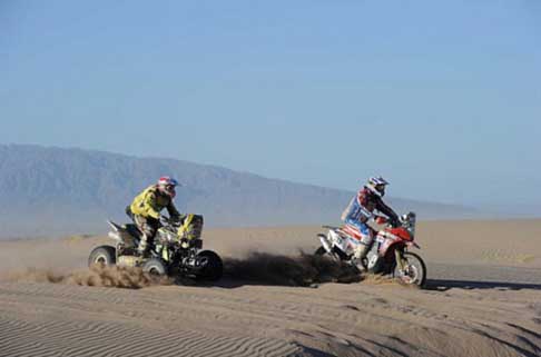 Dakar 2014 - Dakar 2014 stage 5 il driver Mohammed Abu Issa ed il biker Demian Guiral width=