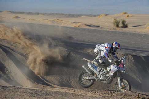 Dakar 2014 - Dakar 2014 stage 5 il biker Xavier De Soultrait che salta una duna width=